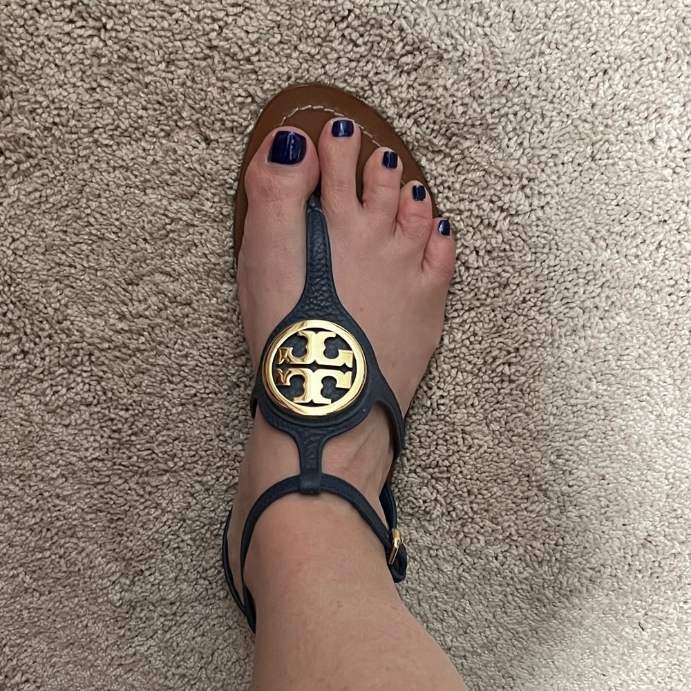 Like new hardly worn.  Tory Burch navy blue sandals.